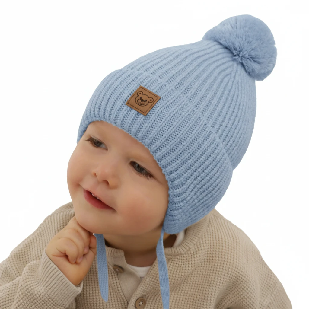 Czapka zimowa dla chłopca, błękitna, 100% wełniana merino, podszyta wełnianym polarem, wiązana Tofik
