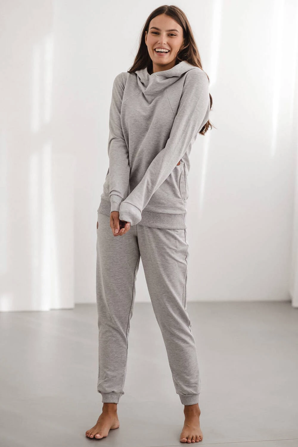 Ciążowe spodnie dresowe jasny szary melanż