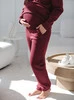 Grube dresowe spodnie ciążowe Motherhood burgundowe