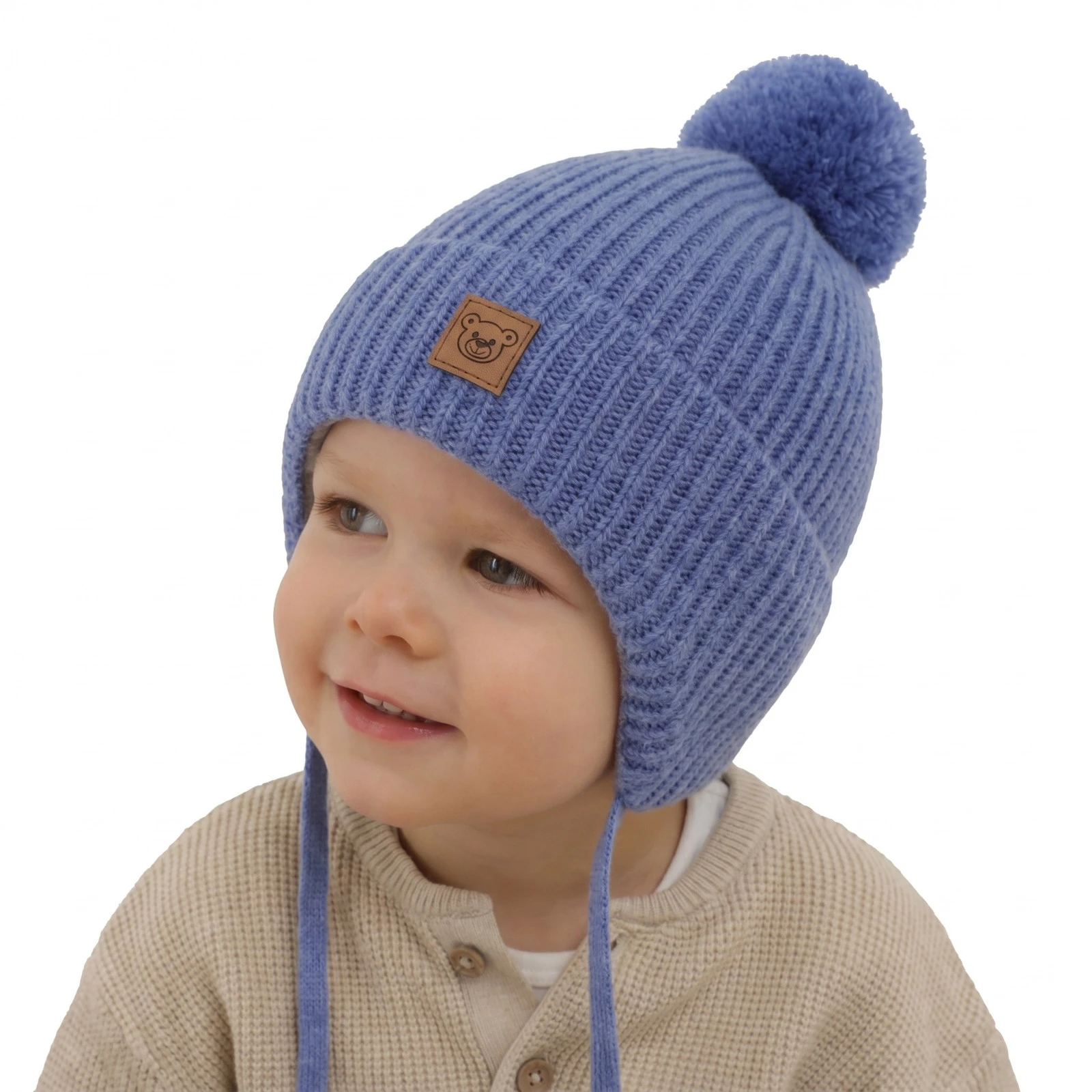 Czapka zimowa dla chłopca, niebieska, 100% wełniana merino, podszyta wełnianym polarem, wiązana Tacco