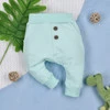Dziecięce spodnie dresowe DINO EXPLORER  z bawełny organicznej