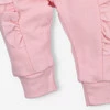 Spodnie niemowlęce Pink flowers z bawełny organicznej dla dziewczynki -  różowe