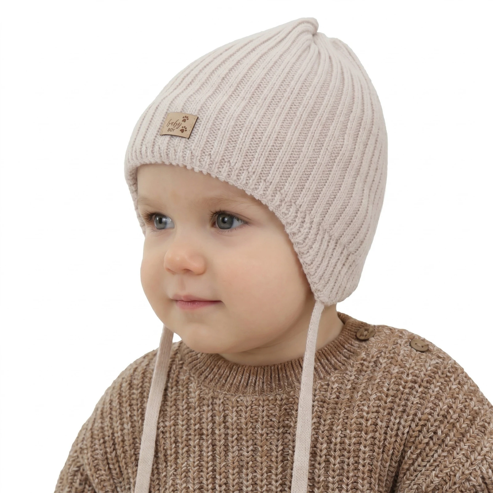 Czapka zimowa dla chłopca, beżowa, wiązana, 100% wełniana merino, podszyta polarem merino, Buno