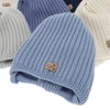 Czapka zimowa dla chłopca, camel, wiązana, 100% wełniana merino, podszyta polarem merino, Buno