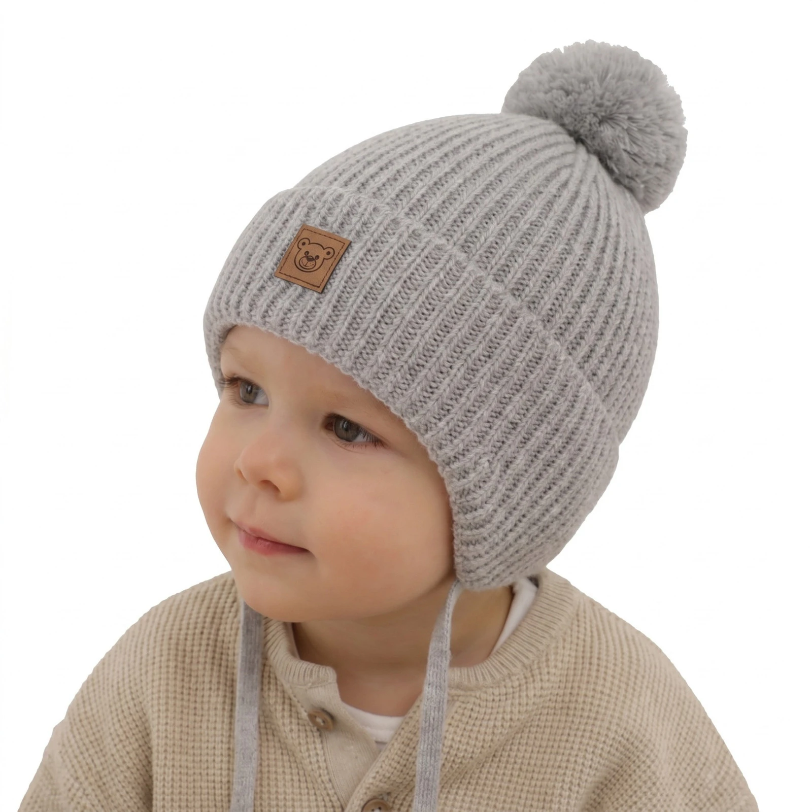 Czapka zimowa dla chłopca, szara, 100% wełniana merino, podszyta wełnianym polarem, wiązana Tacco