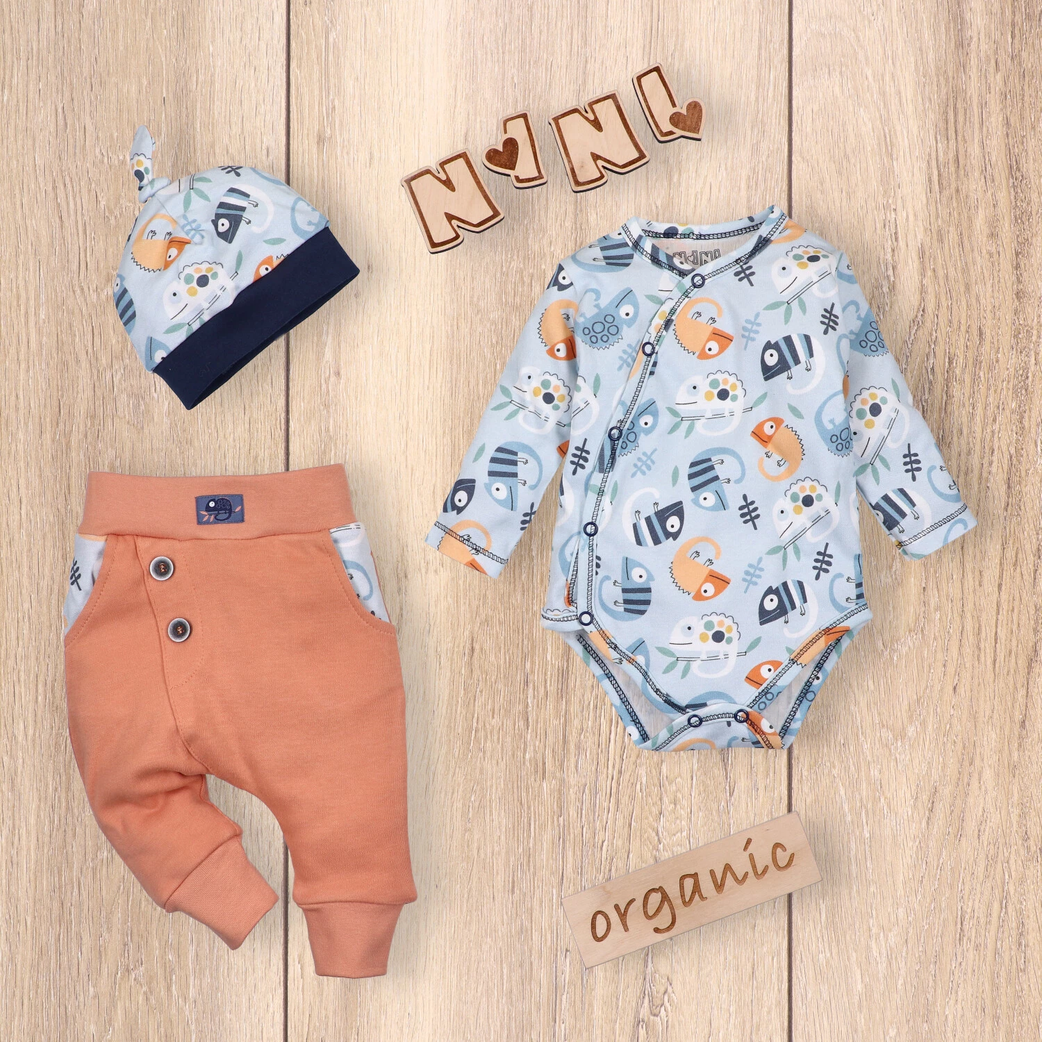 Pomarańczowe dwuwarstwowe spodnie KAMELEON z bawełny organicznej dla chłopca