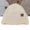 Czapka zimowa dla chłopca, wiązana, z wełną merino, camel Puser