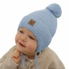 Czapka zimowa dla chłopca, błękitna, 100% wełniana merino, podszyta wełnianym polarem, wiązana Tofik