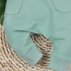 Dziewczęce spodnie dresowe z bawełny organicznej - morskie
