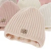 Czapka zimowa dla dziewczynki, różowa, 100% wełniana merino, podszyta polarem merino, wiązana Buma