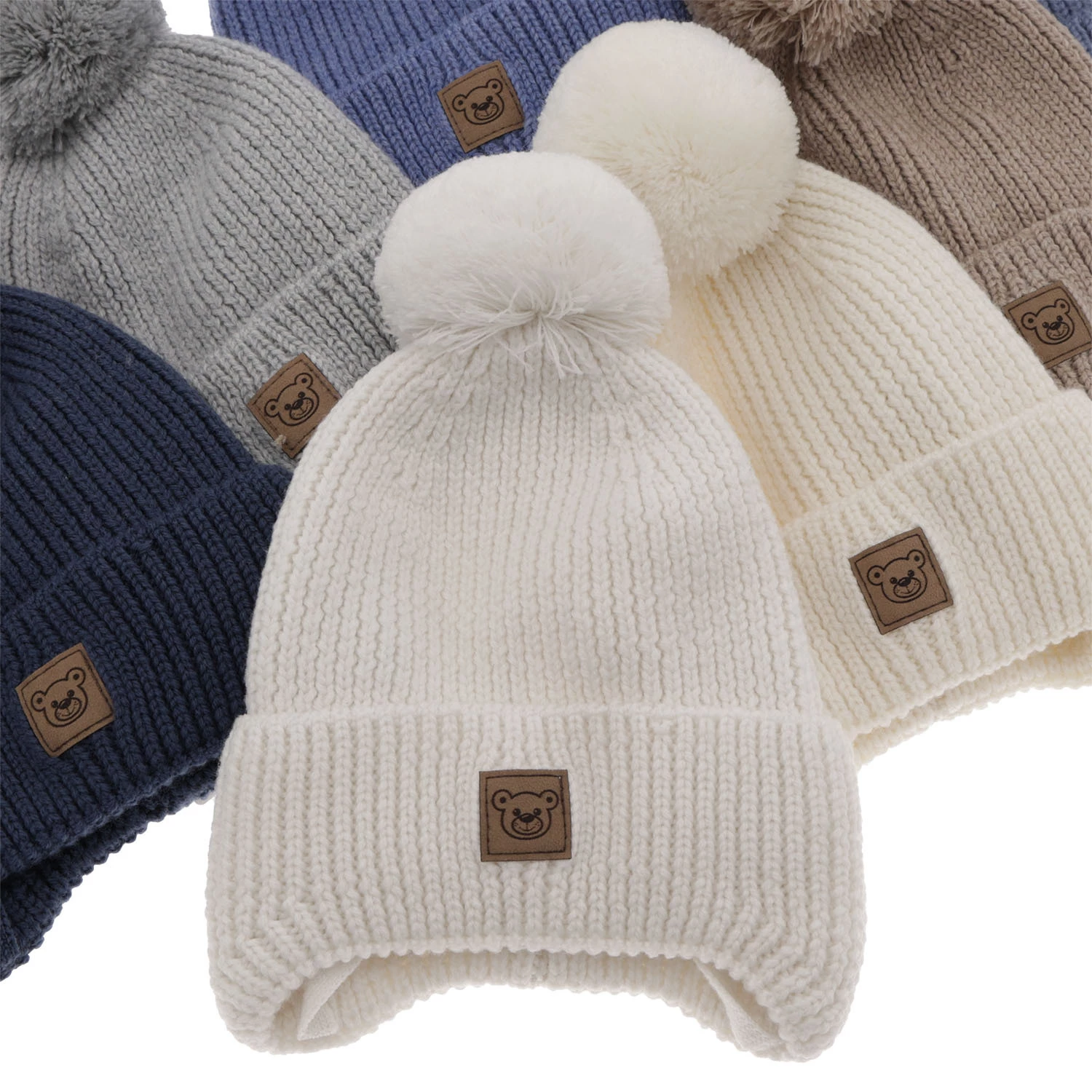 Czapka zimowa dla chłopca, niebieska, 100% wełniana merino, podszyta wełnianym polarem, wiązana Tacco