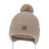 Czapka zimowa dla chłopca, jasnobrązowa, 100% wełniana merino, podszyta wełnianym polarem, wiązana Tacco