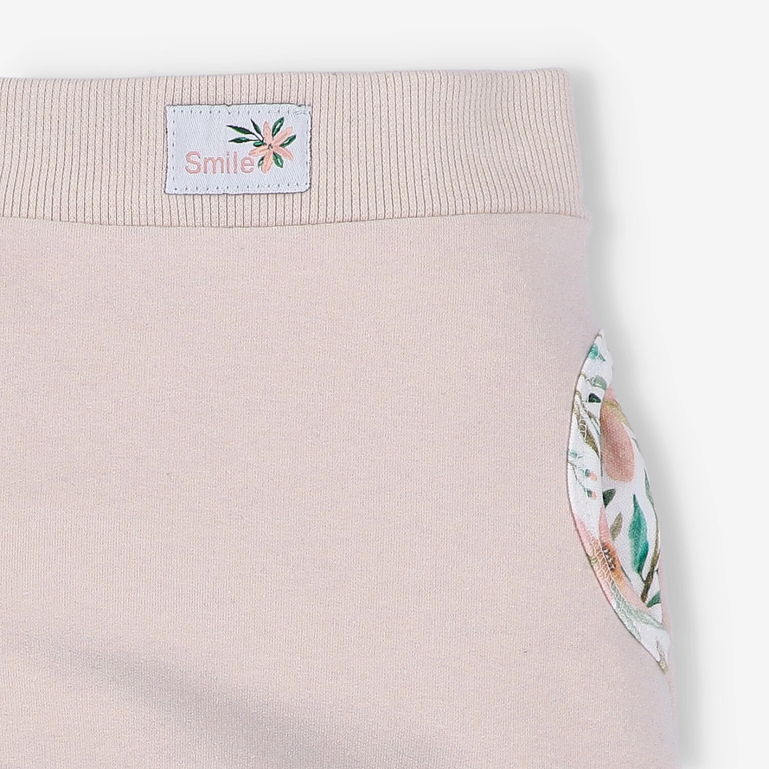 Spodnie dresowe Pink flowers z bawełny organicznej dla dziewczynki - pudrowy róż